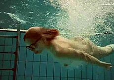 dasha submerged underwater in bikini and naked on beach