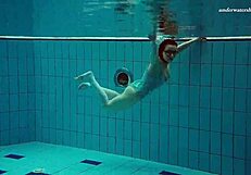 dasha submerged underwater in bikini and naked on beach