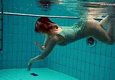 dasha submerged underwater in bikini and naked on beach