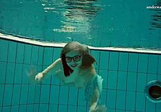 dasha submerged underwater in bikini and naked on beach