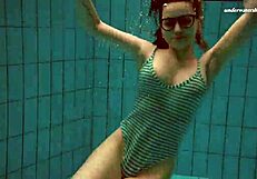 dasha submerged underwater in bikini and naked on beach