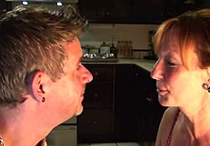 Cute Loving Couple In The Kitchen Sharing Tender Canadian Moments