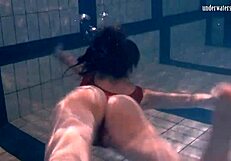 Ivetta plays in the pool, daring you to watch her every move