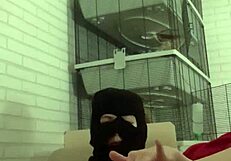 Horny gay guy gets piss play on tattooed ass on sofa