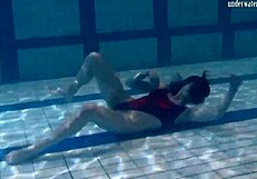 Ivetta plays in the pool, daring you to watch her every move