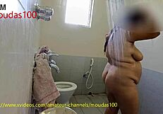 Desi Bengali housewife bathes, showing her juicy big tits and ass
