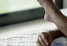 European fetish babe receives oral and footjob from partner.