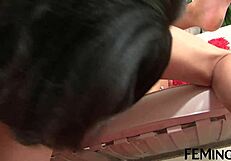 Horny models lick and use strapon in threesome