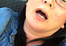 Asian mature wife masturbates outside with sensual foot play