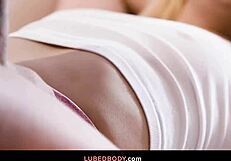 Kali Roses gives her blonde roommate Aria Banks a sensual massage with oil