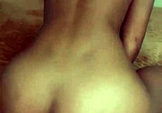 Young amateur's solo play with a dildo