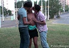 Blonde teen engages in public street orgy gangbang with big dicks