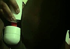 A Goth black beauty enjoys using a vibrator