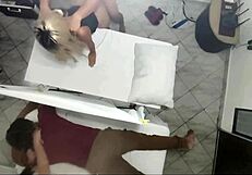 Old man watches his wife get a hot massage