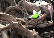 black-haired lesbian gets fingered deep in the mysterious woods