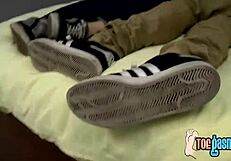 Deviant Twinkie Roman Sucks Dustin Fitch's Toes in Fetish Scene