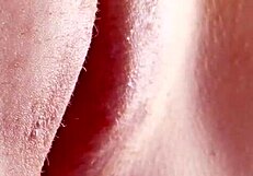 Close up of a sensual pussy licking and fingering scene that results in an orgasm