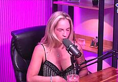 Bisexual lesbian in lingerie reaches orgasm naked in studio