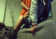 Gay blowjob and couch action with amateur performer