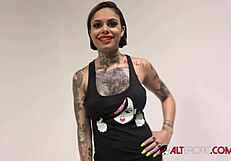 Busty Tattooed Brunette Genevieve Sinn Shares Backstage Interview Details About Her Erotic Ass And Big Tits.
