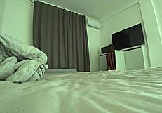 A wife seduces her husband’s young friend in a scene of marital infidelity