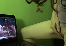 Redhead MILF reaches climax watching videos