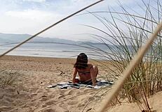 i filmed curvy milf changing and exercising on beach