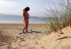 i filmed curvy milf changing and exercising on beach
