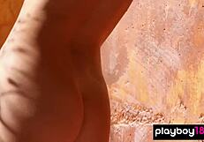 brunette babe strips in bikini under mexican sun