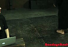 busty sub slave gets her feet punished in fishnets before pissing in the garage