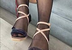 Kenia Teases In Black Stockings And Red Dress