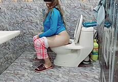 Real Indian Stepsister Caught Pissing and Masturbating in Bathroom! What a Shock!