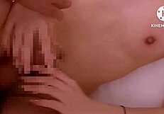 Close up of a Japanese girlfriend's orgasm while being photographed for a homemade porn video