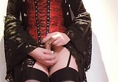 Selena the shemale rocks high heels and stockings, stroking in a long skirt.