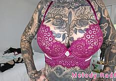 melody radford tries on black lingerie.