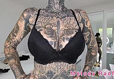 melody radford tries on black lingerie.