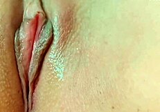 Young shy girl fingers her tight wet pussy to orgasm.