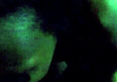 Ebony woman performing oral on a large black phallus