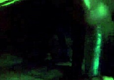 Ebony woman performing oral on a large black phallus