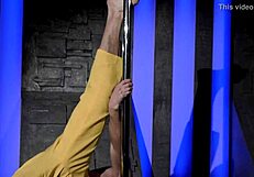 Hot guy does acrobatic pole dance
