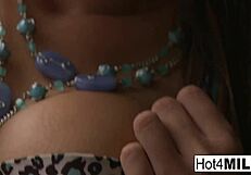 busty brunette babe teases cock with skill in steamy session.