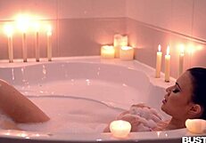 Is This Busty Goddess Jasmine Jae Seductively Masturbating in the Bath?