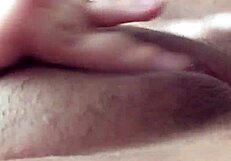 Horny teen stretches wet pussy in public