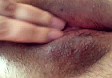 Horny teen stretches wet pussy in public