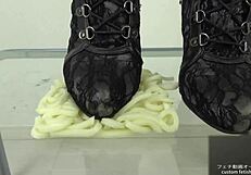 Asian Woman Stomps Noodles In Shoes