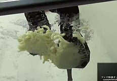 Asian Woman Stomps Noodles In Shoes