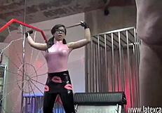 painful whipping session by asian mistress wearing glasses