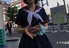 Japanese cute teen idol hides during photoshoot