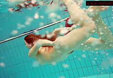 Hairy ginger polish teen 18+ gets naked in bikini at pool underwater