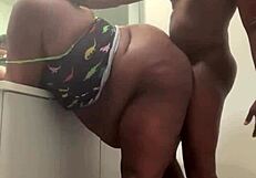 Ebony babe enjoys a quick hardcore fuck in the bathroom with monster cock